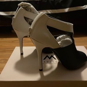 High heel that’s a I think 2” heel is skinny black and white